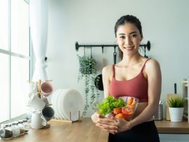 asian-attractive-sport-woman-holding-salad-bowl-an-2021-12-09-15-16-10-XJ3SGYZ.jpg